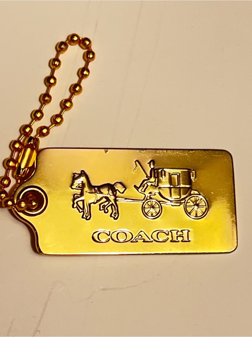 Very Rare Vintage Coach Gold Horse & Carriage Tag Key Holder and bag charm.